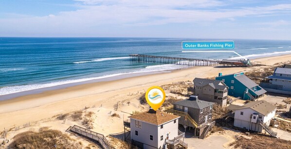 This charming beach home offers direct access to the pristine shoreline and is within walking distance of the Outer Banks Pier and Fishhead's Bar & Grill!