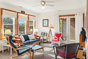 With cozy seating and entertainment options like a Flat-Screen TV, board games, and books, you'll love the chance to relax with your loved ones in the spacious Living Area.