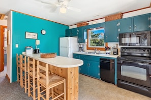 Whip up something delicious in the cozy Kitchen.