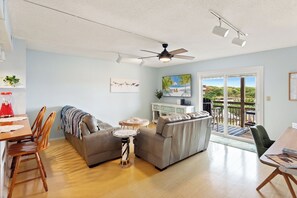 Watch your favorite movies and recount the day's adventures in the spacious Living Area with a Murphy Bed.