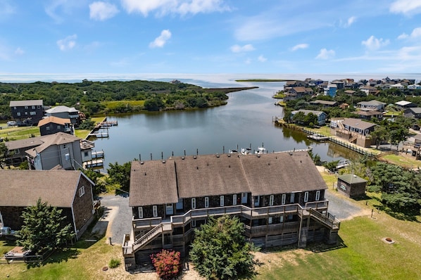 Whether you're soaking up sunsets on your private deck or exploring Avon, Pelican's Hideaway is your perfect soundfront sanctuary.