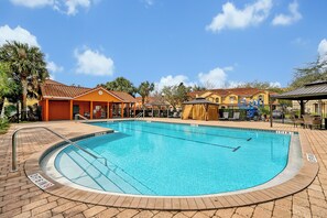 Immerse yourself in the peaceful ambiance of our beautifully maintained community pool, designed for ultimate relaxation.