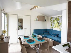 Bright and modern living area in the cottage, designed for comfort and relaxation.