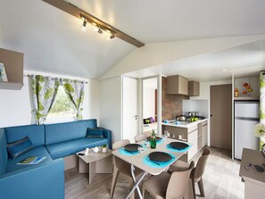 Spacious and stylish dining and lounge area, perfect for family gatherings.