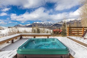 Private hot tub and multi-level deck area