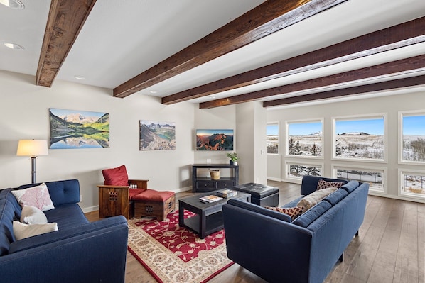 The family room is located a few steps below the kitchen level.