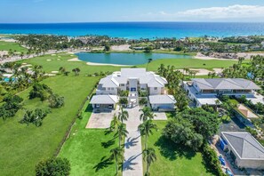 Villa Okyanus: aerial view of the property, golf course and ocean in front
