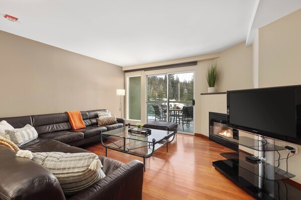 Bright living area with cozy gas fireplace