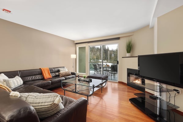 Bright living area with cozy gas fireplace