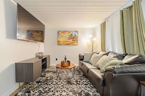 Cozy and warm living room with a welcome special (wine)