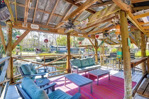 Covered Waterfront Deck | Seating | Canal View