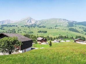 Sky, Grass, Mountainous Landforms, Mountain, Grassland, Hill, House, Highland, Mountain Range, Landscape