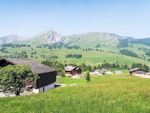 Sky, Grass, Mountainous Landforms, Mountain, Grassland, Hill, House, Highland, Mountain Range, Landscape