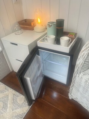 Mini fridge, rechargeable expresso maker, kettle.