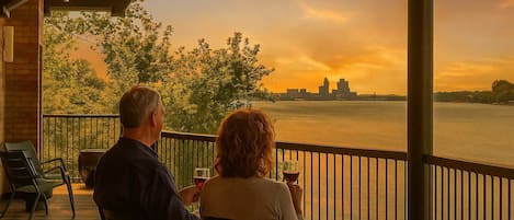 Experience spectacular golden hour views from your spacious outdoor retreat. Sip your favorite drink as the sky transforms over the serene river, an unforgettable end to every day.