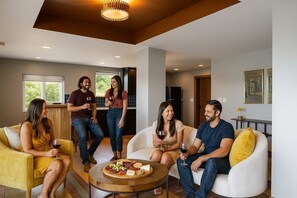 Living Room: Whether it's a casual evening of appetizers and drinks or a lively catch-up session, our comfortable living room provides the ideal setting for connecting with your favorite people.