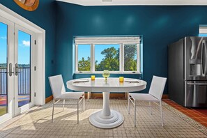 Dining Area: Gather around this stylish dining area — the perfect spot for shared meals, meaningful conversations, and making memories during your stay.
