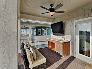 Third Floor Rooftop Balcony - Covered Sitting Area with Wet Bar and TV