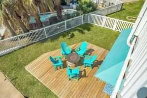 Overlooking the ground level fire pit area