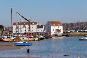 Nearby view across the river to the iconic Tide Mill Museum in Woodbridge.