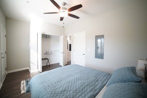 Downstairs bedroom with private bathroom access.