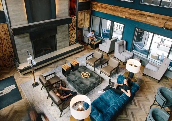Spacious and stylish lounge with plush seating and a welcoming atmosphere, ideal for relaxation or casual conversations.