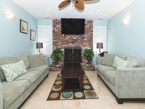 Bright living room with vibrant decor and natural light.