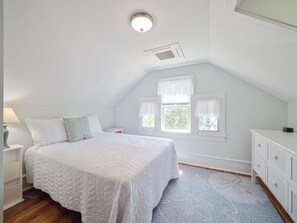 Bright and cozy guest bedroom.