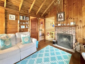 Living Area with Wood Burning Fireplace!
