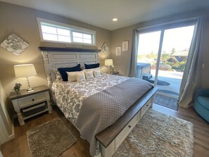The Primary bedroom has access to the hot tub. Convenient for those early morning soaks.