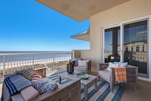 Cozy Seating with Gorgeous Views of the Entire Shoreline on the Private Balcony