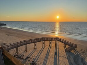 Wake up to sunrise magic—direct beach access with no roads to cross puts the Gulf right at your doorstep.