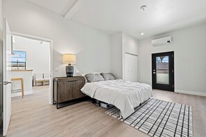 The master bedroom with adjustable king size bed.