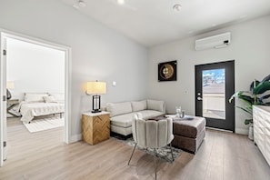 Complemented by towering ceilings that add a touch of luxury.