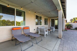 Sun loungers and outdoor seating.