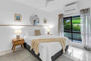 Escape to the serene primary suite, featuring a queen bed, a walk-in wardrobe, and a private ensuite for added convenience and relaxation.