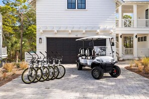 6 seater golf cart and 6 bikes to zip around in
