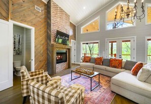 Enjoy chic comfort and a touch of the outdoors with a living room designed for downtime deluxe.