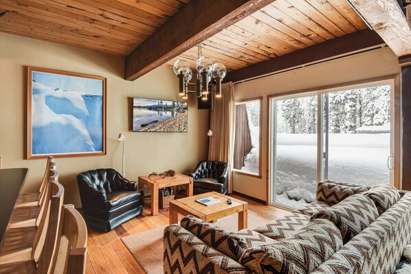 Cozy living area with TV and glass doors