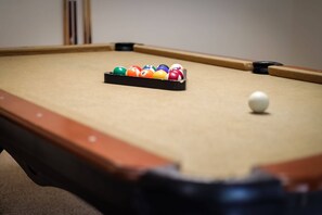 Pool table in game room