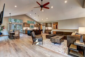 Spacious living space with flat screen TV, fireplace