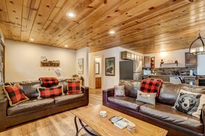 Leather couches + Smart TV with cable