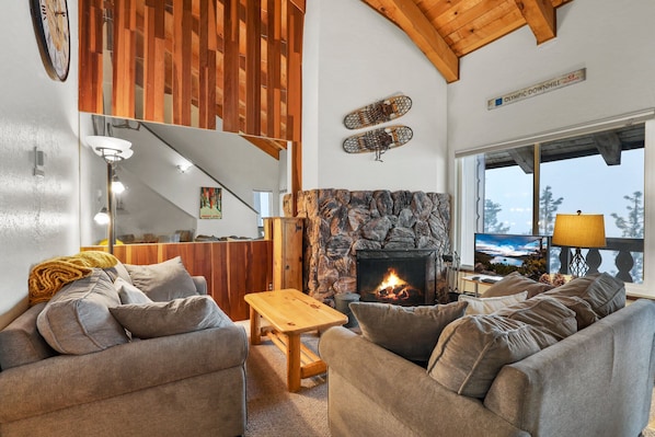 Curl up in the living room with a movie and a fire in the wood fireplace