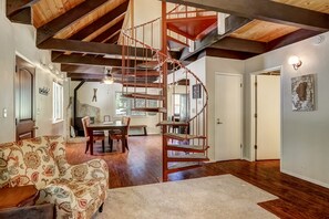 Living area with spiral staircase