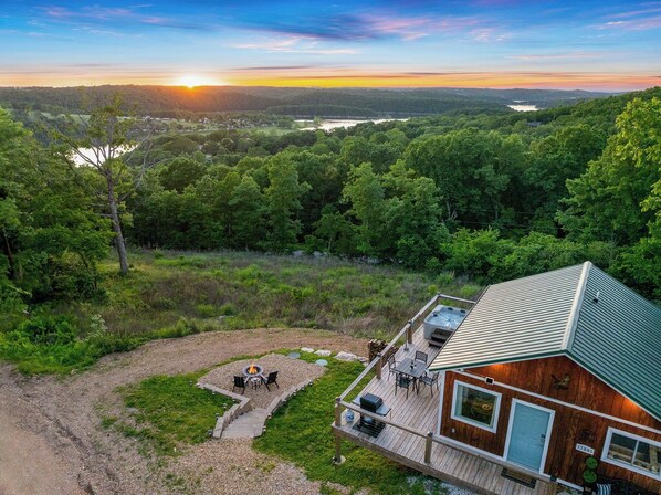 Sunset views, cozy fires, and a private hot tub—your perfect Ozark escape.