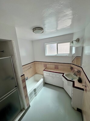 Bathroom with full tub and shower
