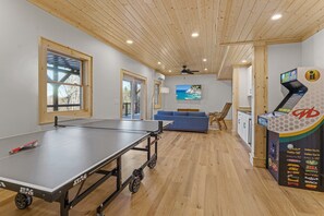 Lower Level Game Room with Ping Pong and Arcade