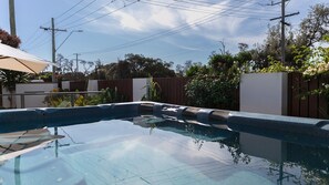 Heated Spa in front courtyard