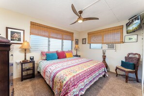 Bedroom has king size bed and AC