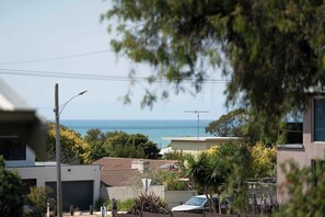 Delight in the view of the ocean from the porch and living room window, reminding you how close you are to the shoreline